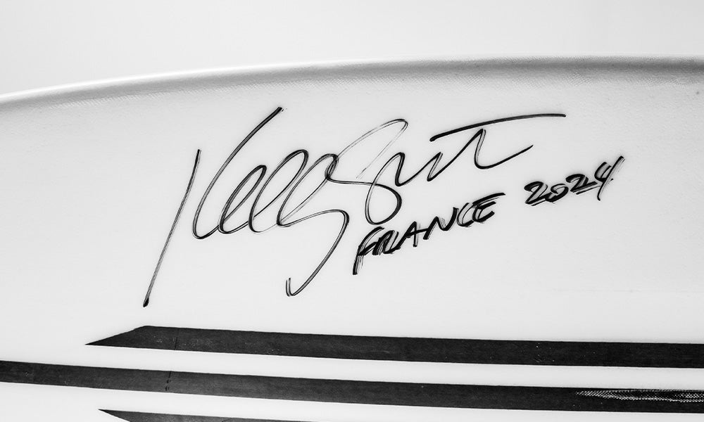 Win a surfboard surfed and signed by Kelly Slater – Bell
